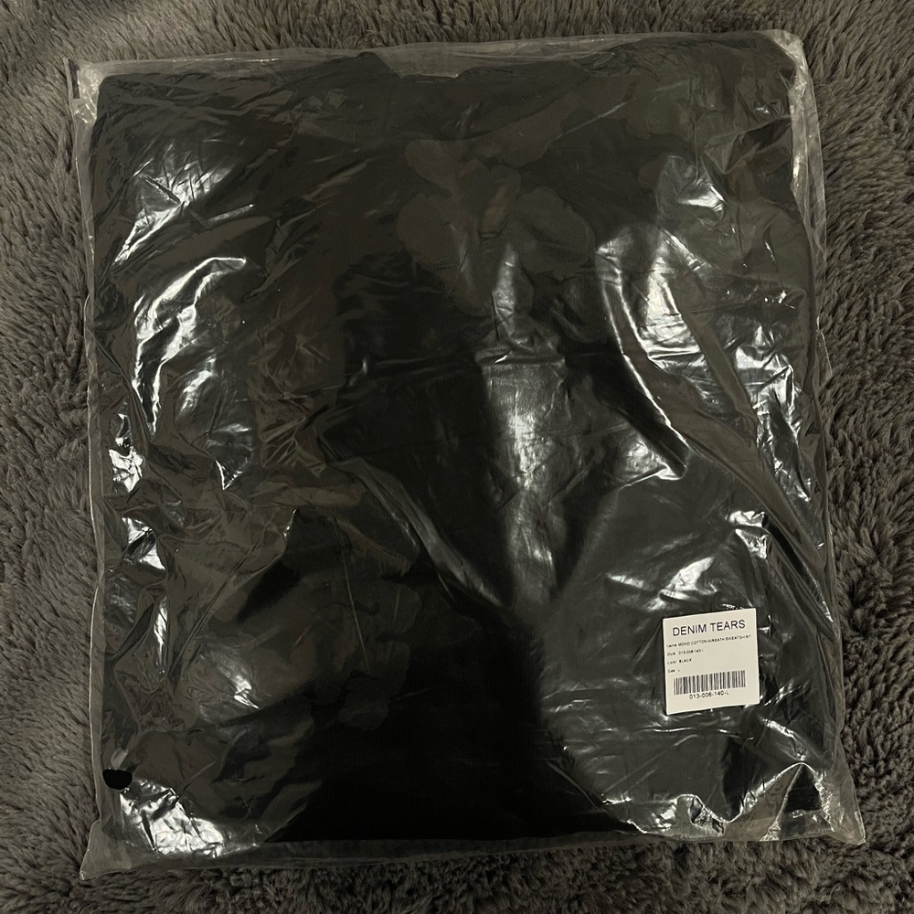 BLACK ON GREY DENIM TEARS HOODIE
(SIZE M)